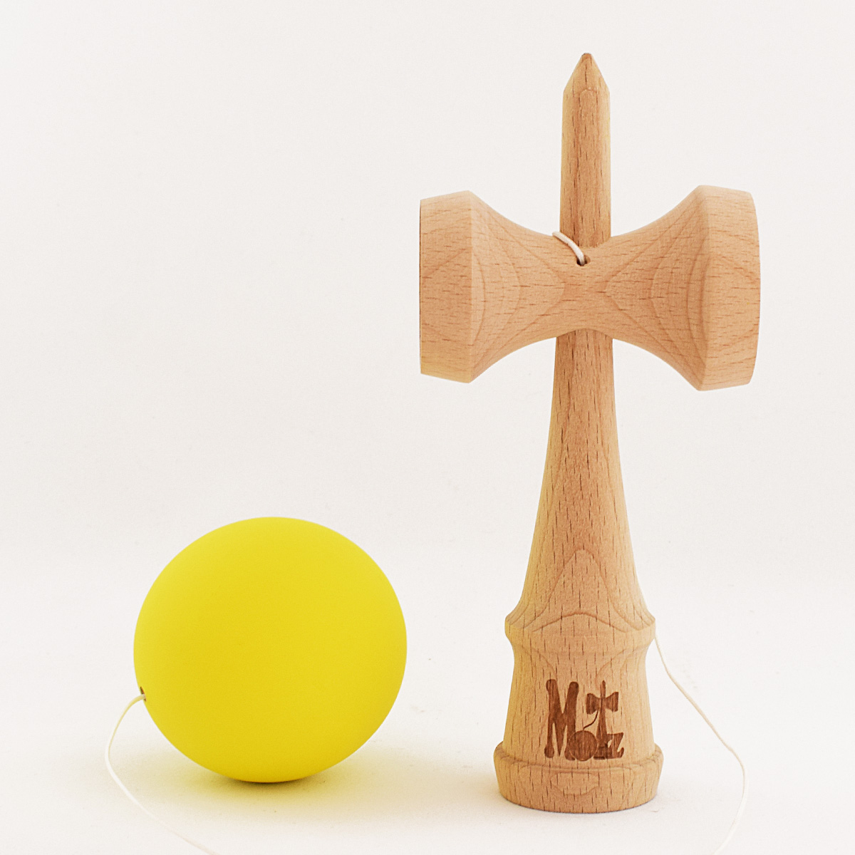 Kendama-Motz-Solid-Yellow-Rubber-2.jpg