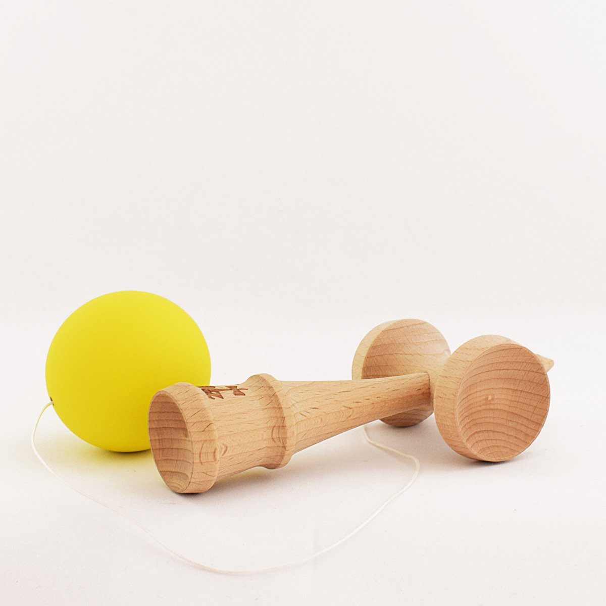 Kendama-Motz-Solid-Yellow-Rubber-3.jpg